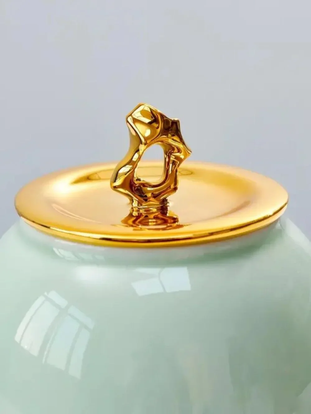 Decorative Mint Green Ceramic Keepsake Urn with Gold Butterfly Accent